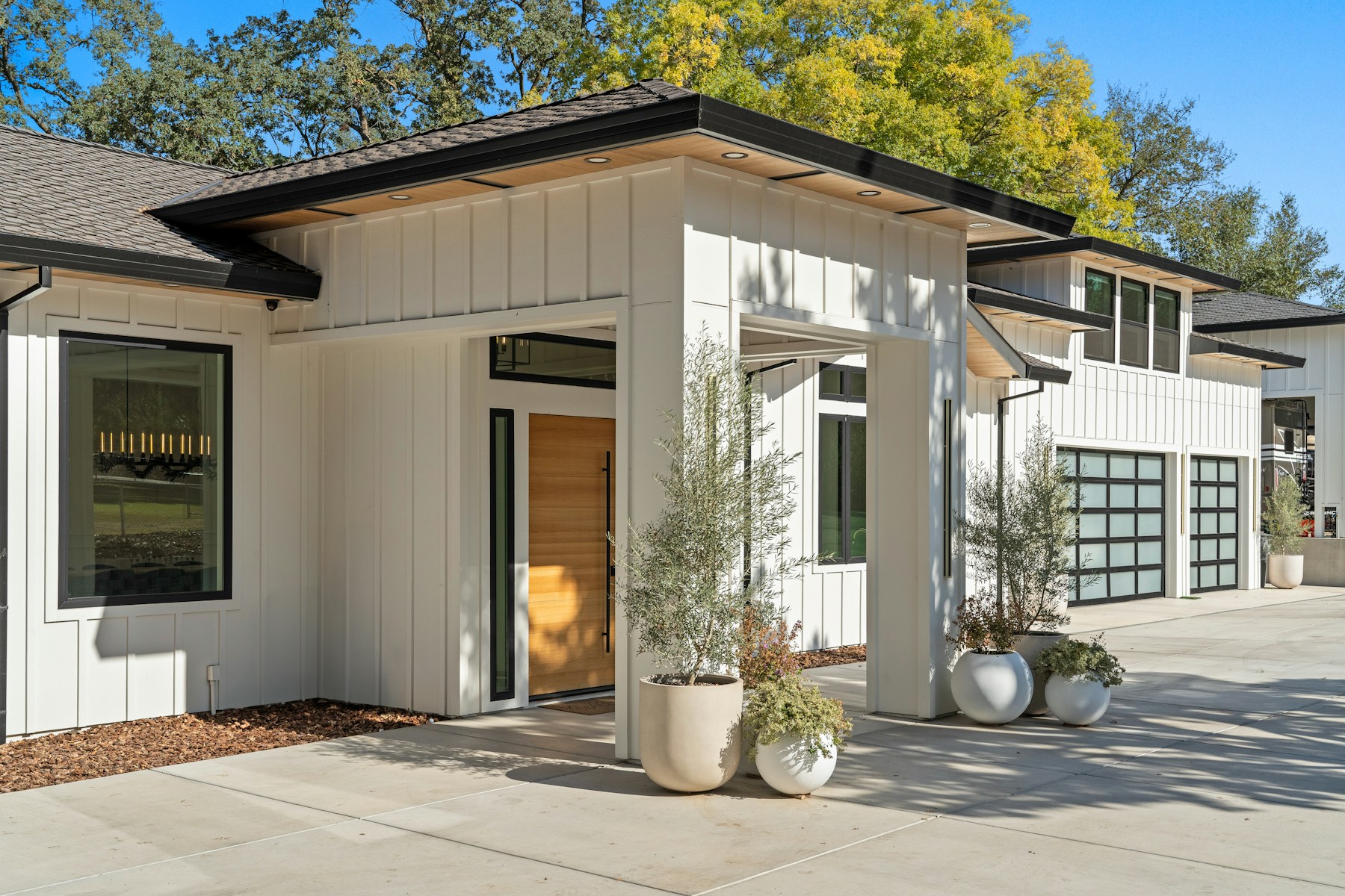 Clean white board and batten siding on a finished home exterior